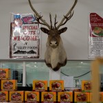 Confronted by Deer Head in the Meat Section, Saratoga, WY