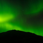 Photographing Greenland’s Photographing Greenland’s Primordial Night Landscape Northern Lights, with Mountain Silhouette in Igaliku: Lecture at Yale Club of New York