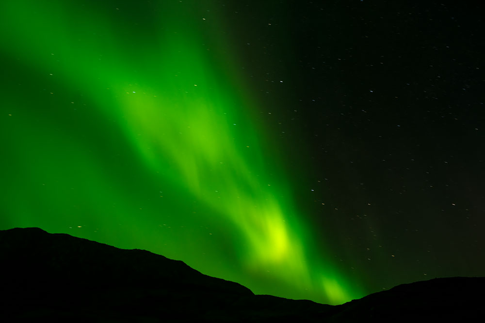 Photographing Greenland’s Photographing Greenland’s Primordial Night Landscape Northern Lights, Mountain Silhouette in Igaliku: Lecture at Yale Club of New York