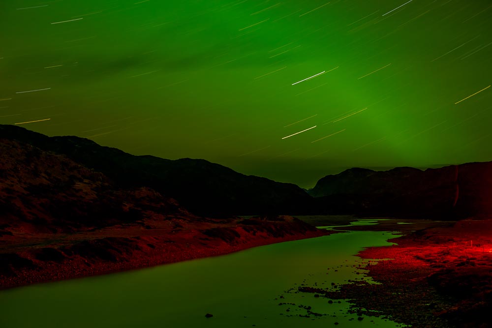 Photographing Greenland's Climate Changes: Night Landscape, Eerie Red River