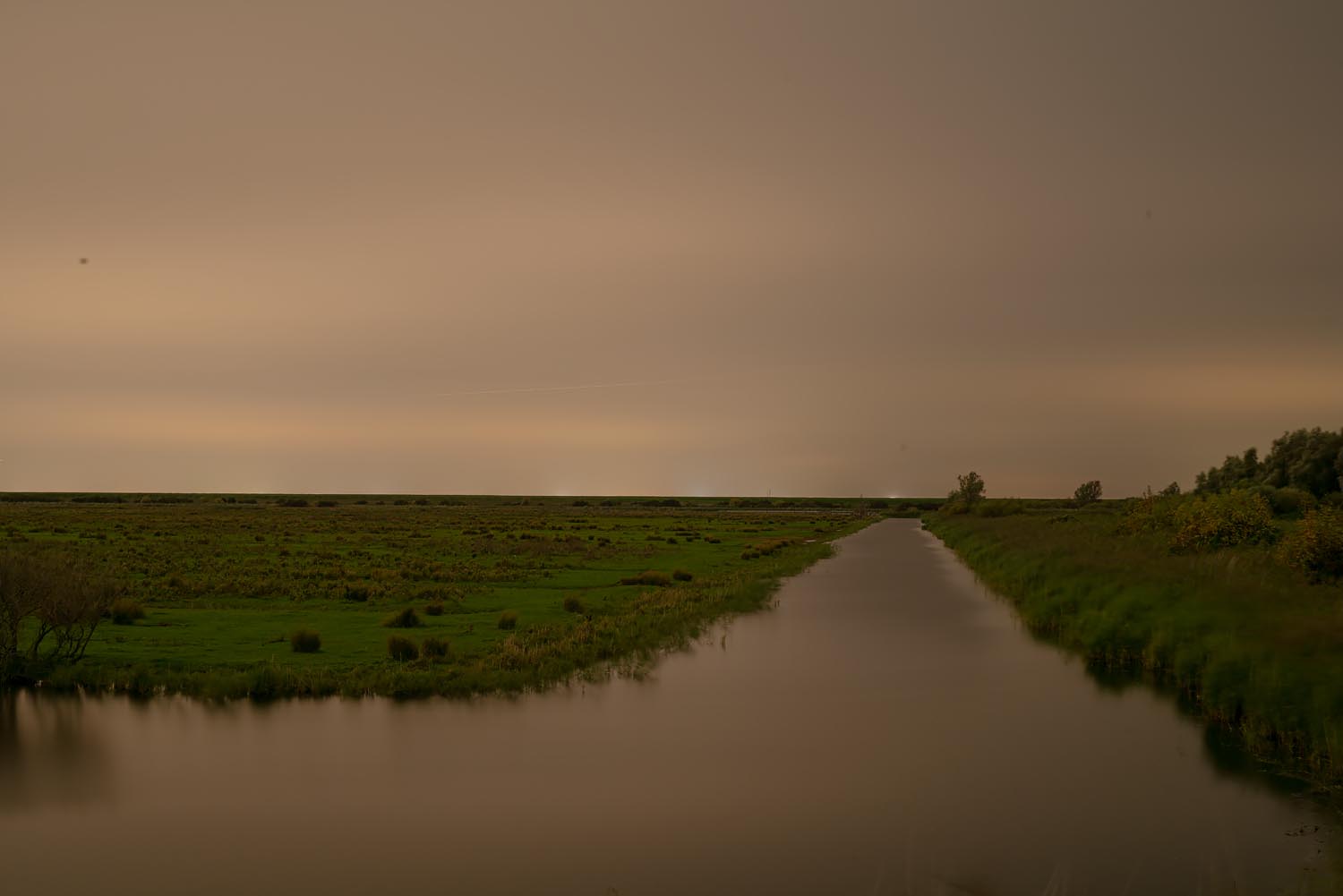 Sites at Risk of Climate Change: Night Landscape Photographs in The Netherlands, Steve Giovinco, Canal, on Yellow Rainy Night, Nieuw Land National Park, Flevoland