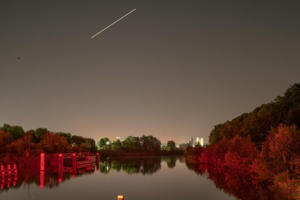 Sites at Risk of Climate Change: Night Landscape Photographs in The Netherlands, Steve Giovinco, Canal Lock, Nieuw Land National Park, Near Almere, Red Glow on Clear Night, Flevoland