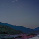 Shadow and Light: New Night Landscape Photographs of Greenland By Steve Giovinco. Red and Green Glacial River