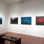 Arctic Edge, Photography Exhibition at Scandinavia House NYC, Night Landscape Photos of Greenland, By Steve Giovinco in Gallery Space with Bench Installation photo by Eileen Travell.